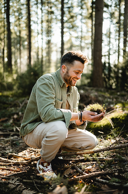 Rolf Johan outdoors among the trees